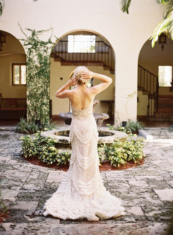 dramatic wedding gown villa inner courtyard fountain